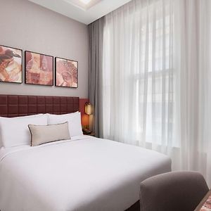 Kamer met een Queen Size Bed